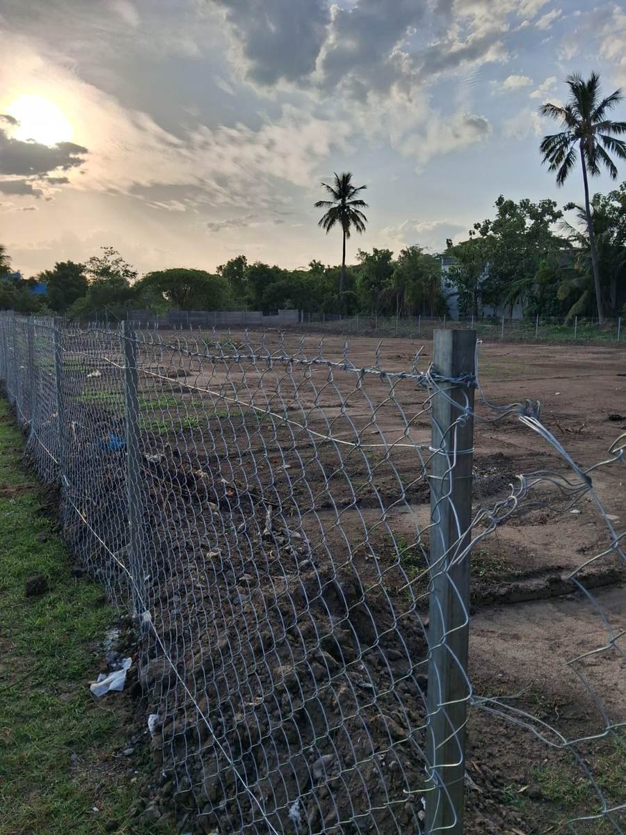 Fully cleared and fenced SWM land at dusk